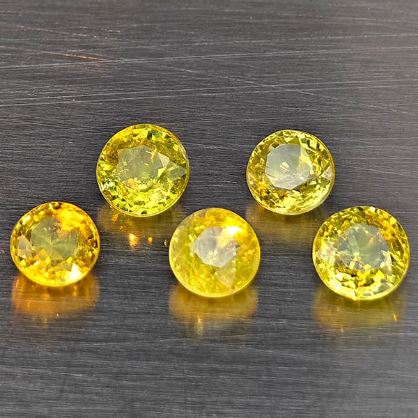 Natural Greenish Yellow Titanium Rainbow Spark Sphene 1.77 Ct. 5 Pcs Round Shape 4 Mm Gemstones from: Product ID: 806509377 Product Name: Natural Sphene Weight: 1.77 CT. Size: 4 x 4 x 2.4 MM. Shape: Round Color: Greenish Yellow Clarity:SI1 Luster: Good Gems Origin: Madagascar Treatment: Unheated Cryst
