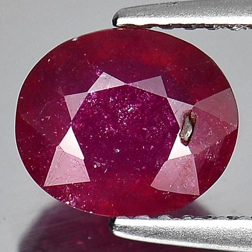 Natural Purplish Red Ruby 2.28 Ct. Oval Shape 8.3 x 7.1 Mm Gemstone from Madagascar: Product ID: 805916929 Product Name: Natural Ruby Weight: 2.28 CT. Size: 8.3 x 7.1 x 3.9 MM. Shape: Oval Color: Purplish Red Clarity:VSI Luster: Good Gems Origin: Madagascar Treatment: Heated (Lead-gla