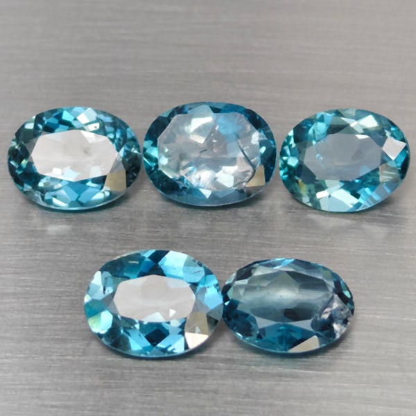Natural London Blue Topaz 9.61 Ct 5 Pcs Oval Shape 9.2 x 7.3 Mm Gemstones From Brazil: Product ID: 807168953 Product Name: Natural Blue Topaz Weight: 9.61 CT. Size: 9.2 x 7.3 x 4.5 MM. Shape: Oval Color: London Blue Clarity:SI1 Luster: Good Gems Origin: Brazil Treatment: Treated Crystal