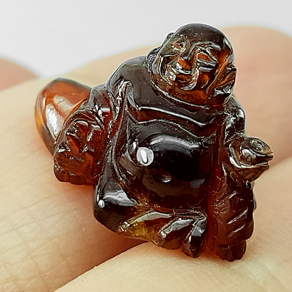 Natural Orange Spessartine Garnet 16.15 Ct.Happy Buddha Carving 17.5 x 15.5 Mm Gemstone From Namibia: Product ID: 501200052 Product Name: Natural Spessartine Weight: 16.15 CT. Size: 15.5 x 17.5 x 12.5 MM. Shape: Carving Color: Orange Honey Natural Color Clarity:None Luster: Good Carving Gems Origin: N
