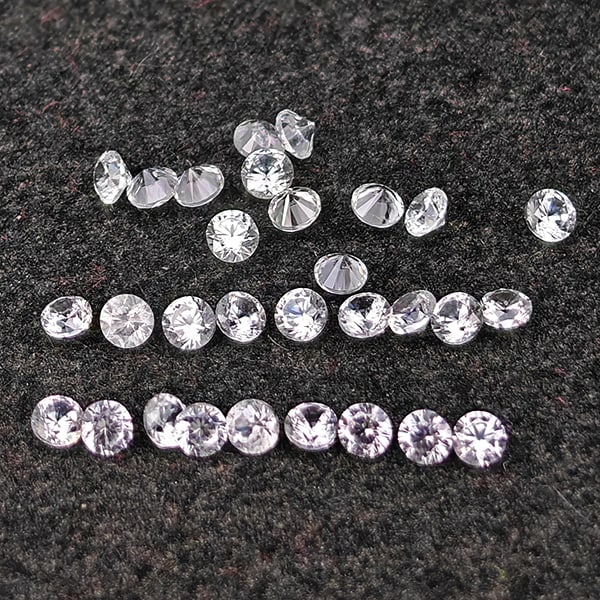 Natural White Zircon 0.64 Ct. 30 Pcs Round Diamond Cut 1.5 Mm Gemstone from Combodia: Product ID: 807743104 Product Name: Natural Zircon Weight: 0.64 CT. Size: 1.5 x 1.5 x 1.2 MM. Shape: Round Diamond Cut Color: White Clarity:VSI Luster: Good Gems Origin: Cambodia Treatment: Heated Cry