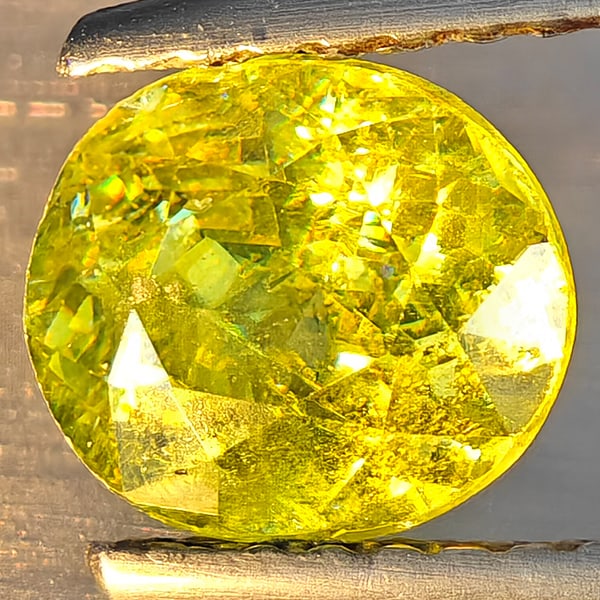 Natural Multi-Color With Rainbow Spark Sphene 2.01 Ct. Oval Shape 7.1 x 6.3 Mm Gemstone From: Product ID: 806509218 Product Name: Natural Sphene Weight: 2.01 CT. Size: 7.1 x 6.3 x 4.6 MM. Shape: Oval Shape Color: Multi-Color Clarity:SI1 Luster: Good Gems Origin: Madagascar Treatment: Unheated