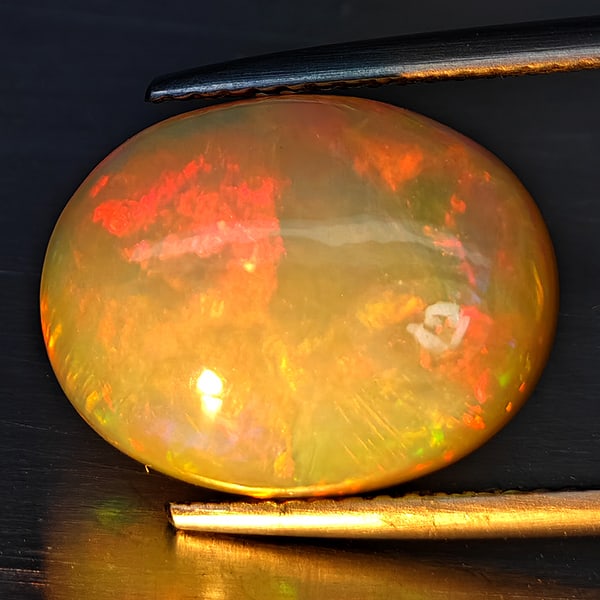 Natural Multi Color Opal 5.64 Ct. Oval Cabochon Shape 15.3 x 11.8 Mm Gemstone from Ethiopia (1 of 3)