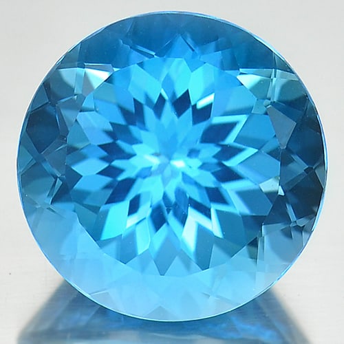 Natural Swiss Blue Topaz 14.92 Ct. Clean Round Cornflower Cut 15 Mm. Gemstone from Brazil: Product ID: 807166771 Product Name: Natural Blue Topaz Weight: 14.92 CT. Size: 15 x 15 x 10.3 MM. Shape: Round Color: Blue Clarity:IF Luster: Good Gems Origin: Brazil Treatment: Treated Crystal Struct
