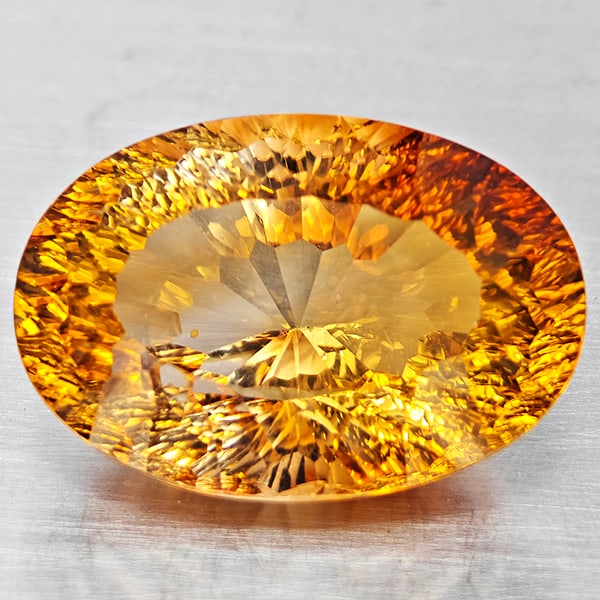 Natural Imperial Topaz 22.87 Ct. VVS Oval Concave Cut 20 x 13.9 Mm. Gemstone From Brazil: Product ID: 807168621 Product Name: Natural Topaz Weight: 22.87 CT. Size: 20 x 13.9 x 11.2 MM. Shape: Oval Shape Color: Imperial Clarity:VVS Luster: Very Good Gems Origin: Brazil Treatment: Treated Cr