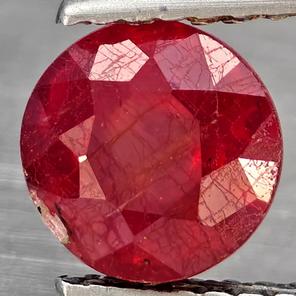 Natural Pinkish Red Ruby 1.77 Ct. Round Shape 6.6 Mm Gemstone From Madagascar: Product ID: 805935867 Product Name: Natural Ruby Weight: 1.77 CT. Size: 6.6 x 6.6 x 4.8 MM. Shape: Round Color: Pinkish Red Clarity:SI1 Luster: Good Gems Origin: Madagascar Treatment: Heated (Lead-gla