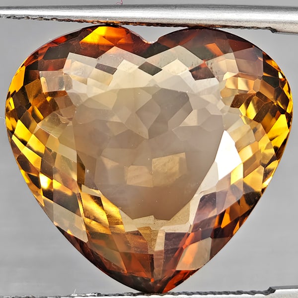 Natural Imperial Topaz 18.92 Ct. Heart Shape 18 x 16.8 Mm Gemstone From Brazil: Product ID: 807168595 Product Name: Natural Topaz Weight: 18.92 CT. Size: 18 x 16.8 x 8.5 MM. Shape: Heart Shape Color: Imperial Clarity:VSI Luster: Good Gems Origin: Brazil Treatment: Treated Crystal