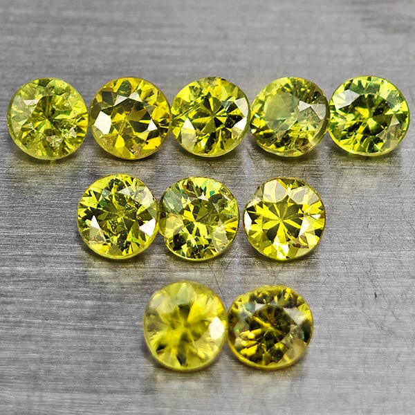 Natural Green Demantiod Garnet 1.67 Ct. 10 Pcs Round Diamond Cut 3.2 Mm Gemstones From Madagascar: Product ID: 802937666 Product Name: Natural Demantoid Weight: 1.67 CT. Size: 3.2 x 3.2 x 2.3 MM. Shape: Round Diamond Cut Color: Green Clarity:SI1 Luster: Good Gems Origin: Madagascar Treatment: Unhea