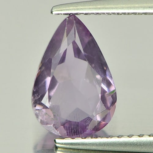 Natural Purple Amethyst 1.46 Ct. Pear Shape 10 x 6.9 Mm Gemstone from Brazil: Product ID: 800313870 Product Name: Natural Amethyst Weight: 1.46 CT. Size: 10 x 6.9 x 4.1 MM. Shape: Pear Color: Purple Clarity:VSI Luster: Good Gems Origin: Brazil Treatment: Unheated Crystal Struct