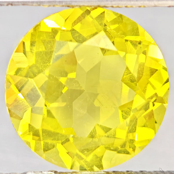 Natural Yellow Lemon Quartz 3.63 Ct. Round Shape 10.1 Mm Gemstone From Brazil: Product ID: 805530191 Product Name: Natural Quartz Weight: 3.63 CT. Size: 10.1 x 10.1 x 6.5 MM. Shape: Round Shape Color: Yellow Lemon Clarity:VSI Luster: Good Gems Origin: Brazil Treatment: Unheated