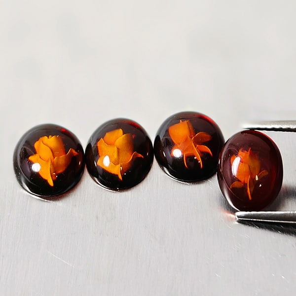 Natural Brown Yellow Amber 2.67 Ct. 4 Pcs. Flower Carving In Oval Cabochon Shape 10 x 8.2 Mm: Product ID: 819091025 Product Name: Natural Amber Weight: 2.67 CT. Size: 10 x 8.2 x 3.4 MM. Shape: Oval Cabochon Color: Brown Yellow Clarity:Semi - Transparent Luster: Good Gems Origin: Poland Treatme