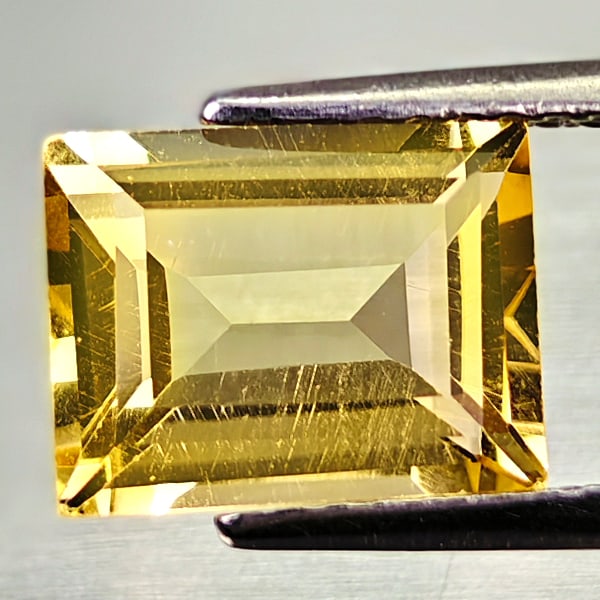 Natural Yellow Citrine 2.25 Ct. Baguette Shape 9.2 x 7.1 Mm Gemstone from Brazil: Product ID: 801815021 Product Name: Natural Citrine Weight: 2.25 CT. Size: 9.2 x 7.1 x 4.5 MM. Shape: Baguette Color: Yellow Clarity:VSI Luster: Good Gems Origin: Brazil Treatment: Unheated Crystal St