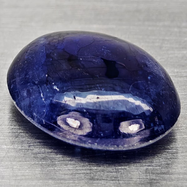 Natural Blue Sapphire 2.61 Ct. Oval Cabochon Shape 10.8 x 8.6 Mm Gemstone From Madagascar: Product ID: 806012360 Product Name: Natural Blue Sapphire Weight: 2.61 CT. Size: 10.8 x 8.6 x 4.4 MM. Shape: Oval Cabochon Color: Blue Clarity:Semi - Transparent Luster: Good Gems Origin: Madagascar T