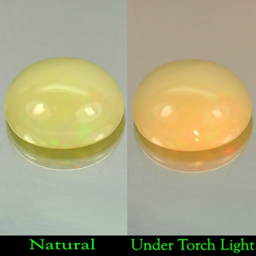 Natural Multi Color Opal 5.02 Ct. Oval Cabochon Shape 13.3 x 11.2 Mm Gemstone from Ethiopia: Product ID: 818714737 Product Name: Natural Opal Weight: 5.02 CT. Size: 13.3 x 11.2 x 6.7 MM. Shape: Oval Cabochon Color: Multi-Color Clarity:Opaque Luster: Iridescent Gems Origin: Ethiopia Treatment:
