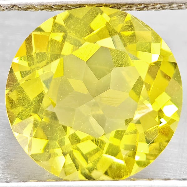 Natural Yellow Lemon Quartz 2.57 Ct. Round Shape 9.1 Mm Gemstone From Brazil: Product ID: 805530179 Product Name: Natural Quartz Weight: 2.57 CT. Size: 9.1 x 9.1 x 5.8 MM. Shape: Round Color: Yellow Lemon Clarity:VSI Luster: Good Gems Origin: Brazil Treatment: Unheated Crystal
