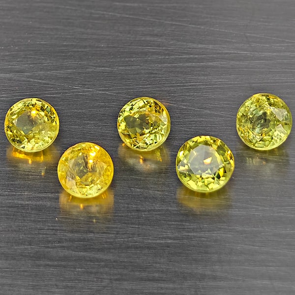 Natural Greenish Yellow Titanium Rainbow Spark Sphene 1.76 Ct. 5 Pcs Round Shape 4.2 Mm Gemstones: Product ID: 806509366 Product Name: Natural Sphene Weight: 1.76 CT. Size: 4.2 x 4.2 x 2.8 MM. Shape: Round Color: Greenish Yellow Clarity:SI1 Luster: Good Gems Origin: Madagascar Treatment: Unheated C