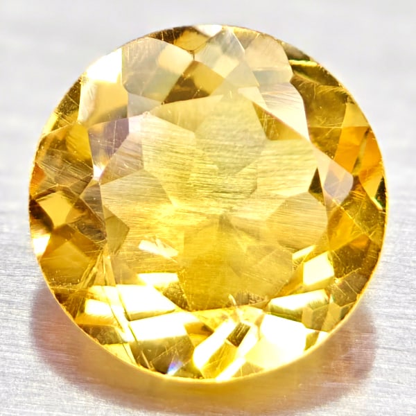 Natural Yellow Citrine 1.8 Ct. Round Shape 7 Mm. Gemstone From Brazil: Product ID: 801813566 Product Name: Natural Citrine Weight: 1.80 CT. Size: 7 x 7 x 4 MM. Shape: Round Color: yellow Clarity:VVS Luster: Good Gems Origin: Barzil Treatment: Unheated Crystal Structure: