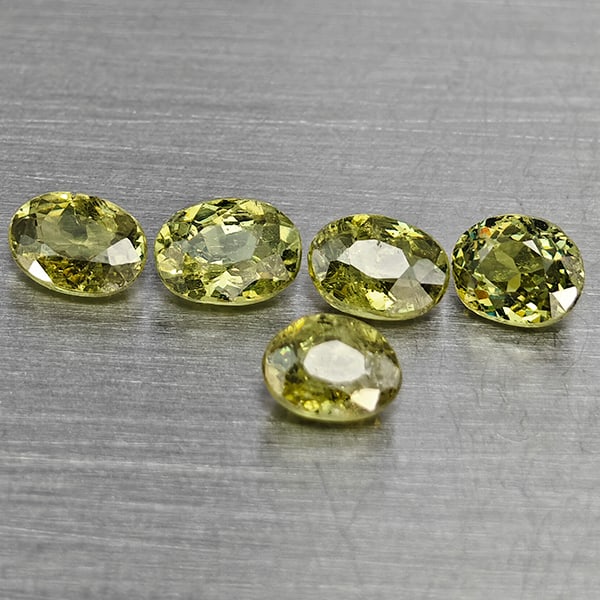 Natural Green Demantiod Garnet Gemstones 1.19 Ct. 5 Pcs Oval Shape 4 x 3.2 Mm: Product ID: 802937613 Product Name: Natural Demantoid Weight: 1.19 CT. Size: 4 x 3.2 x 2 MM. Shape: Oval Shape Color: Green Clarity:SI1 Luster: Good Gems Origin: Madagascar Treatment: Unheated Crystal