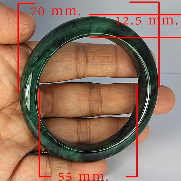 Natural Green Jade Bangle 301.02 Ct. Diameter 55 Mm. Unheated Gemstone: Product ID: 819816055 Product Name: Natural Gemstones Weight: 301.02 CT. Size: 70 x 55 x 12.5 MM. Shape: Round Color: Multi-Color Clarity:Opaque Luster: Good Gems Origin: Thailand Treatment: Unheated