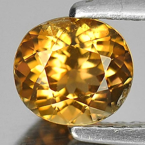 Natural Yellowish Brown Tourmaline Gemstone 0.97 Ct. Oval Shape 6.3 x 5.7 Mm.: Product ID: 807246067 Product Name: Natural Tourmaline Weight: 0.97 CT. Size: 6.3 x 5.7 x 4.2 MM. Shape: Oval Color: Yellowish Brown Clarity:VSI Luster: Good Gems Origin: Nigeria Treatment: Unheated C