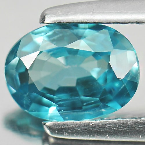Natural Blue Zircon Gemstone 1.01 Ct. VVS Oval Shape 7 x 5.1 Mm.: Product ID: 807721526 Product Name: Natural Zircon Weight: 1.01 CT. Size: 7 x 5.1 x 2.8 MM. Shape: Oval Color: Blue Clarity:VVS Luster: Good Gems Origin: Cambodia Treatment: Heated Crystal Structure: 