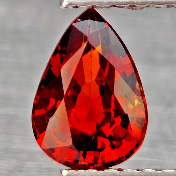 Natural Orangish Red Spessartine Garnet Gemstone 1.05 Ct. Pear Shape 7.4 x 5.3 Mm.: Product ID: 802937356 Product Name: Natural Garnet Weight: 1.05 CT. Size: 7.4 x 5.3 x 3.3 MM. Shape: Pear Shape Color: Orangish Red Clarity:VSI Luster: Good Gems Origin: Namibia Treatment: Unheated Cr