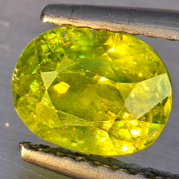 Natural Multi-Color With Rainbow Spark Sphene 1.68 Ct. Oval Shape 7.6 x 6.1 Mm Gemstone From: Product ID: 806509187 Product Name: Natural Sphene Weight: 1.68 CT. Size: 7.6 x 6.1 x 5.5 MM. Shape: Oval Shape Color: Multi-Color Clarity:SI1 Luster: Good Gems Origin: Madagascar Treatment: Unheated 
