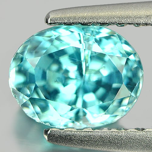 Natural Blue Zircon 1.48 Ct. Oval Shape 6.5 x 5.1 Mm Gemstone from Cambodia: Product ID: 807714870 Product Name: Natural Zircon Weight: 1.48 CT. Size: 6.5 x 5.1 x 4.4 MM. Shape: Oval Color: Blue Clarity:SI Luster: Good Gems Origin: Cambodia Treatment: Heated Crystal Structure: