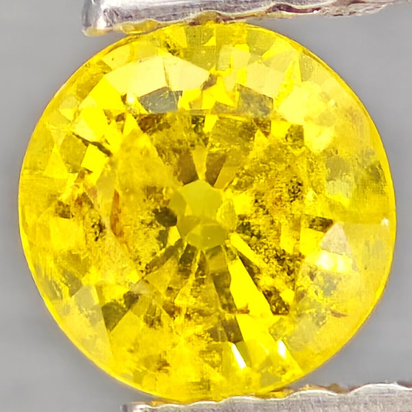 Natural Yellow Sapphire Gemstones 0.71 Ct. Round Shape 5.2 Mm: Product ID: 806162944 Product Name: Natural Yellow Sapphire Weight: 0.71 CT. Size: 5.2 x 5.2 x 3.2 MM. Shape: Round Shape Color: Yellow Clarity:VSI Luster: Good Gems Origin: Thailand Treatment: Heated