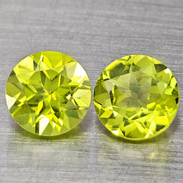 Natural Green Peridot Gemstones 1.27 Ct. 2 Pcs. Round Shape 5.2 Mm.: Product ID: 805317597 Product Name: Natural Peridot Weight: 1.27 CT. Size: 5.2 x 5.2 x 3.5 MM. Shape: Round Color: Green Clarity:VSI Luster: Good Gems Origin: Pakistan Treatment: Unheated Crystal Stru
