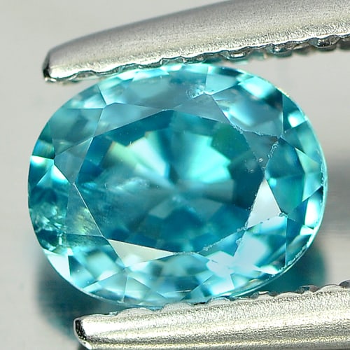 Natural Blue Zircon Gemstones 0.84 Ct. Oval Shape 5.9 x 4.8 Mm: Product ID: 807709618 Product Name: Natural Zircon Weight: 0.84 CT. Size: 5.9 x 4.8 x 3 MM. Shape: Oval Color: Blue Clarity:SI Luster: Good Gems Origin: Cambodia Treatment: Heated Crystal Structure: T