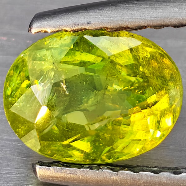 Natural Multi-Color Sphene Gemstones With Rainbow Spark 1.37 Ct. Oval Shape 7.6 x 5.9 Mm: Product ID: 806509196 Product Name: Natural Sphene Weight: 1.37 CT. Size: 7.6 x 5.9 x 4 MM. Shape: Oval Shape Color: Multi-Color Clarity:SI1 Luster: Good Gems Origin: Madagascar Treatment: Unheated Cr