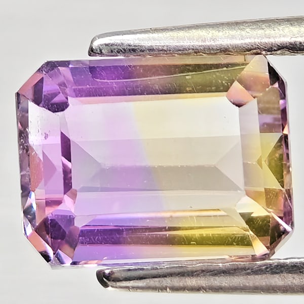 Natural Bi Color Ametrine Gemstones 1.85 Ct. Octagon Shape 8.1 x 6.2 Mm: Product ID: 800408429 Product Name: Natural Ametrine Weight: 1.85 CT. Size: 8.1 x 6.2 x 4.7 MM. Shape: Octagon Color: Bi Color Clarity:VSI Luster: Good Gems Origin: Bolivia Treatment: Unheated Crystal