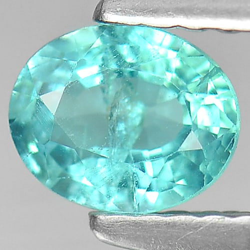 Natural Papaiba Color Apatite Gemstones 0.58 Ct. Oval Shape 5.9 x 4.8 Mm: Product ID: 800604043 Product Name: Natural Apatite Weight: 0.58 CT. Size: 5.9 X 4.8 X 3 MM. Shape: Oval Color: Neon Blue Clarity:SI Luster: Good Gems Origin: Tanzania Treatment: Unheated Crystal Stru