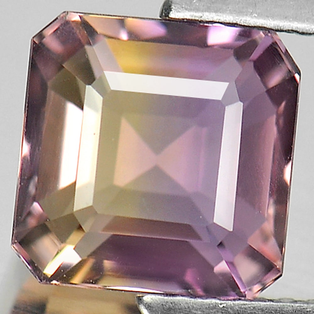 Natural Bi Color Ametrine Gemstones 2.99 Ct. VVS Octagon Shape 8.3 x 8.3 Mm.: Product ID: 800404957 Product Name: Natural Ametrine Weight: 2.99 CT. Size: 8.3 x 8.3 x 6 MM. Shape: Octagon Color: Bi Color Clarity:VVS Luster: Good Gems Origin: Bolivia Treatment: Unheated Crystal S