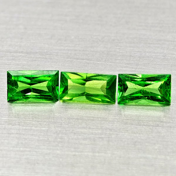 Natural Green Tsavorite Garnet 0.60 Ct. 3 Pcs Baguette Shape 4.8 x 2.4 Mm: Product ID: 803005040 Product Name: Natural Tsavorite Weight: 0.60 CT. Size: 4.8 x 2.4 x 1.8 MM. Shape: Baguette Color: Green Clarity:SI1 Luster: Good Gems Origin: Tanzania Treatment: Unheated Crystal