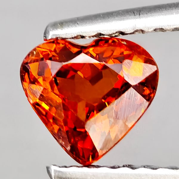 Natural Reddish Orange Spessartine Garnet Gemstones 1.04 Ct. Heart Shape 6 x 5.5 Mm: Product ID: 802937850 Product Name: Natural Spessartine Weight: 1.04 CT. Size: 6 x 5.5 x 3.8 MM. Shape: Heart Shape Color: Reddish Orange Clarity:VSI Luster: Good Gems Origin: Namibia Treatment: Unhea