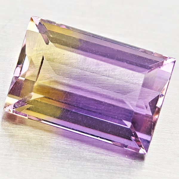 Natural Bi Color Ametrine Gemstones 2.78 Ct. Baguette Shape 10.2 x 6.8 Mm: Product ID: 800408464 Product Name: Natural Ametrine Weight: 2.78 CT. Size: 10.2 x 6.8 x 5.1 MM. Shape: Baguette Color: Bi Color Clarity:VSI Luster: Good Gems Origin: Bolivia Treatment: Unheated Cryst