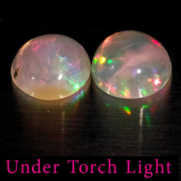 Natural Multi Color Opal Gemstones 1.48 Ct. 2 Pcs Round Cabochon Shape 6.9 Mm: Product ID: 818728196 Product Name: Natural Opal Weight: 1.48 CT. Size: 6.9 x 6.9 x 3.2 MM. Shape: Round Cabochon Color: Multi-Color Clarity:Semi - Transparent Luster: Good Gems Origin: Ethiopia Treat
