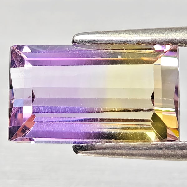 Natural Bi Color Ametrine 2.30 Ct. Octagon Shape 10.2 x 6.1 Mm Gemstone From Bolivia: Product ID: 800408420 Product Name: Natural Ametrine Weight: 2.30 CT. Size: 10.2 x 6.1 x 4.8 MM. Shape: Octagon Color: Bi Color Clarity:VSI - SI1 Luster: Good Gems Origin: Bolivia Treatment: Unheated 