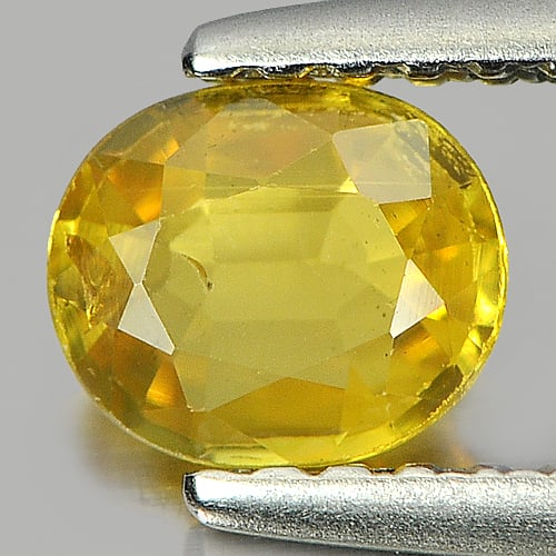 Natural Yellow Sapphire 0.55 Ct. Oval Shape 5.7 x 4.8 Mm Gemstone from Thailand: Product ID: 806160944 Product Name: Natural Yellow Sapphire Weight: 0.55 CT. Size: 5.7 x 4.8 x 2 MM. Shape: Oval Color: Yellow Clarity:VSI Luster: Good Gems Origin: Thailand Treatment: Heated Crystal 