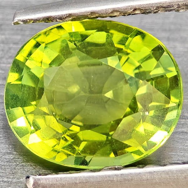Natural Green Tourmaline 1.27 Ct. Oval Shape 7 x 5.8 Mm. Unheated Gemstone from Nigeria: Product ID: 807251119 Product Name: Natural Tourmaline Weight: 1.27 CT. Size: 7 x 5.8 x 4 MM. Shape: Oval Shape Color: Green Clarity:VSI Luster: Very Good Gems Origin: Nigeria Treatment: Unheated Crys