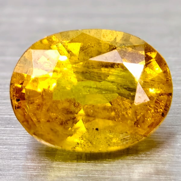 Natural Canary Yellow Sapphire 1.20 Ct. Oval Shape 6.8 x 3.2 Mm Gemstone from Africa: Product ID: 106101012 Product Name: Natural Yellow Sapphire Weight: 1.20 CT. Size: 6.8 x 3.2 x 3.9 MM. Shape: Oval Color: Canary Yellow Clarity:SI Luster: Good Gems Origin: Africa Treatment: Heated Cr