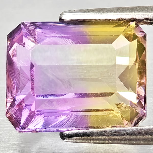 Natural Bi Color Ametrine 2.61 Ct. Octagon Shape 9.2 x 7.3 Mm Gemstone From Bolivia: Product ID: 800408316 Product Name: Natural Ametrine Weight: 2.61 CT. Size: 9.2 x 7.3 x 5.1 MM. Shape: Octagon Color: Bi Color Clarity:VSI Luster: Good Gems Origin: Bolivia Treatment: Unheated Crystal