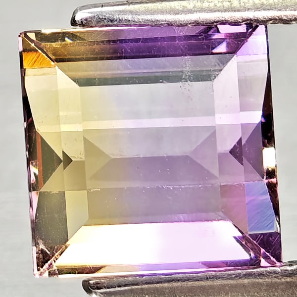 Natural Bi Color Ametrine Gemstones 2.88 Ct. Baguette Shape 8.2 x 8.1 Mm.: Product ID: 800408211 Product Name: Natural Ametrine Weight: 2.88 CT. Size: 8.2 x 8.1 x 5.6 MM. Shape: Baguette Color: Bi Color Clarity:VSI Luster: Very Good Gems Origin: Bolivia Treatment: Unheated C