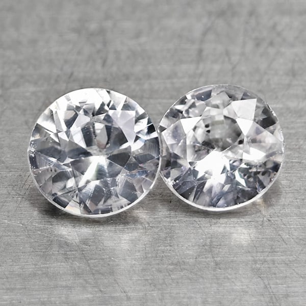 Natural White Zircon Gemstones 1.02 Ct. 2 Pcs. Round Diamond Cut 4.4 Mm.: Product ID: 807742871 Product Name: Natural Zircon Weight: 1.02 CT. Size: 4.4 x 4.4 x 2.7 MM. Shape: Round Diamond Cut Color: White Clarity:VVS Luster: Good Gems Origin: Cambodia Treatment: Heated Cry
