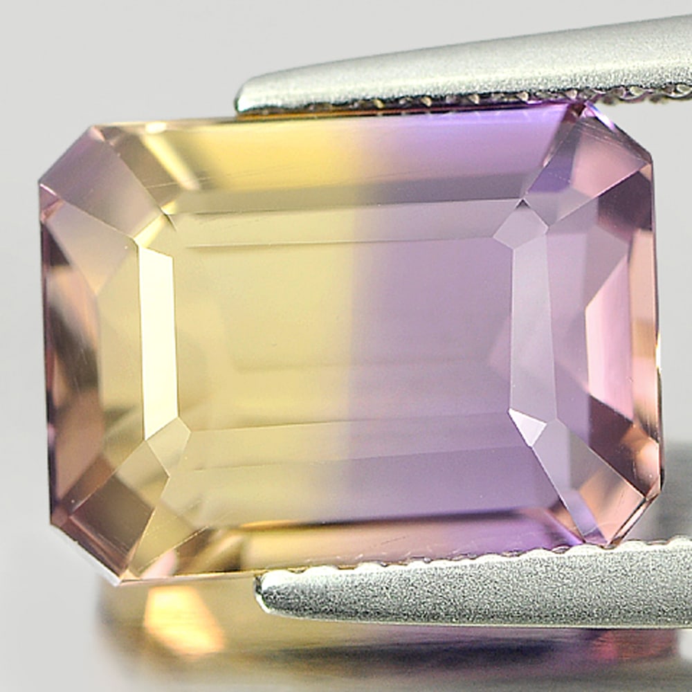 Natural Bi Color Ametrine Gemstones 4.21 Ct. Octagon Shape 11.2 x 8.5 Mm.: Product ID: 800405036 Product Name: Natural Ametrine Weight: 4.21 CT. Size: 11.2 x 8.5 x 5.8 MM. Shape: Octagon Color: Bi Color Clarity:VVS Luster: Good Gems Origin: Bolivia Treatment: Unheated Crysta