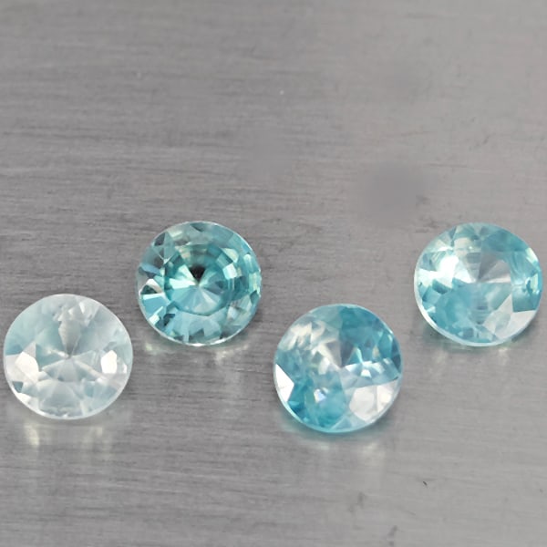 Natural Blue Zircon Gemstones 1.88 Ct. 4 Pcs Round Diamond Cut 4.6 Mm.: Product ID: 807743246 Product Name: Natural Zircon Weight: 1.88 CT. Size: 4.6 x 4.6 x 2.9 MM. Shape: Round Diamond Cut Color: Blue Clarity:SI1 Luster: Good Gems Origin: Cambodia Treatment: Heated Crys