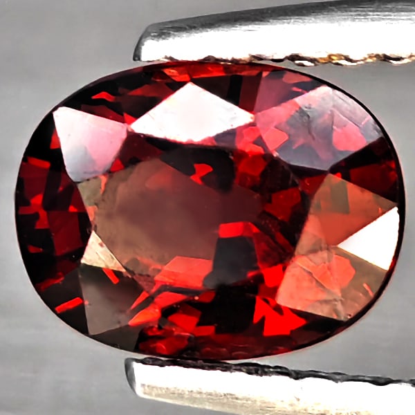 Natural Orangish Red Rhodolite Garnet 1.88 Ct Oval Shape 8 x 6.2 Mm.: Product ID: 802925121 Product Name: Natural Rhodolite Weight: 1.88 CT. Size: 8 x 6.2 x 4.4 MM. Shape: Oval Color: Orangish Red Clarity:VVS Luster: Good Gems Origin: Mardagascar Treatment: Unheated Cry