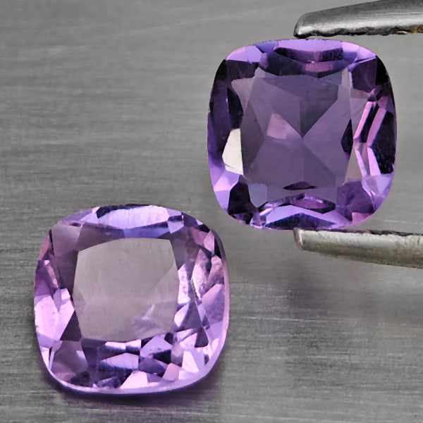 Natural Purple Amethyst Gemstones 1.68 Ct. 2 Pcs.Cushion Shape 6.4 Mm.: Product ID: 800325557 Product Name: Natural Amethyst Weight: 1.68 CT. Size: 6.4 x 6.4 x 3.7 MM. Shape: Cushion Shape Color: Purple Clarity:VSI Luster: Good Gems Origin: Brazil Treatment: Unheated Crys